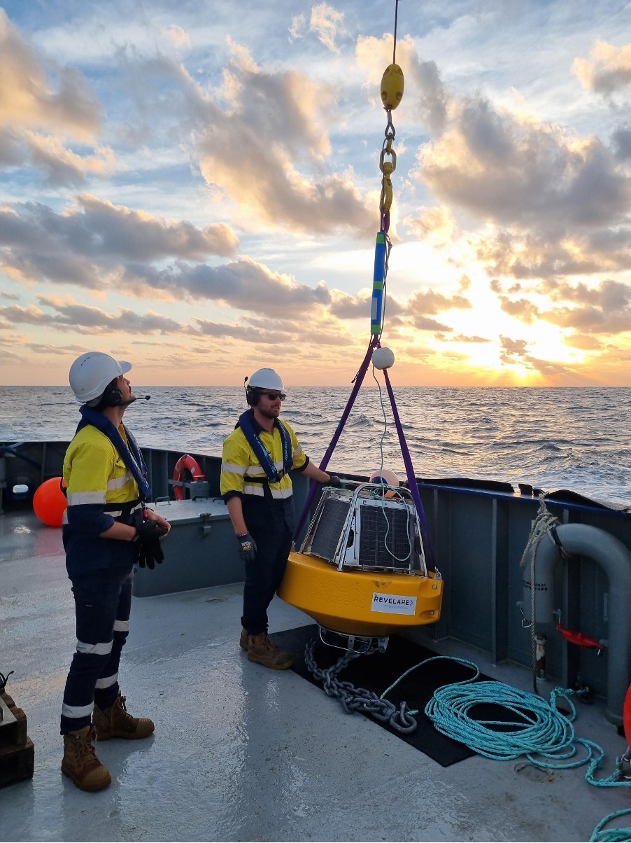 Hydrographic surveyors conducting deck operations and deploying survey equipment during an offshore project
